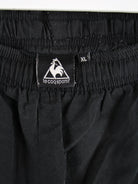 Le Coq Sportif Track Pants Schwarz XL – Detailansicht Vorderseite