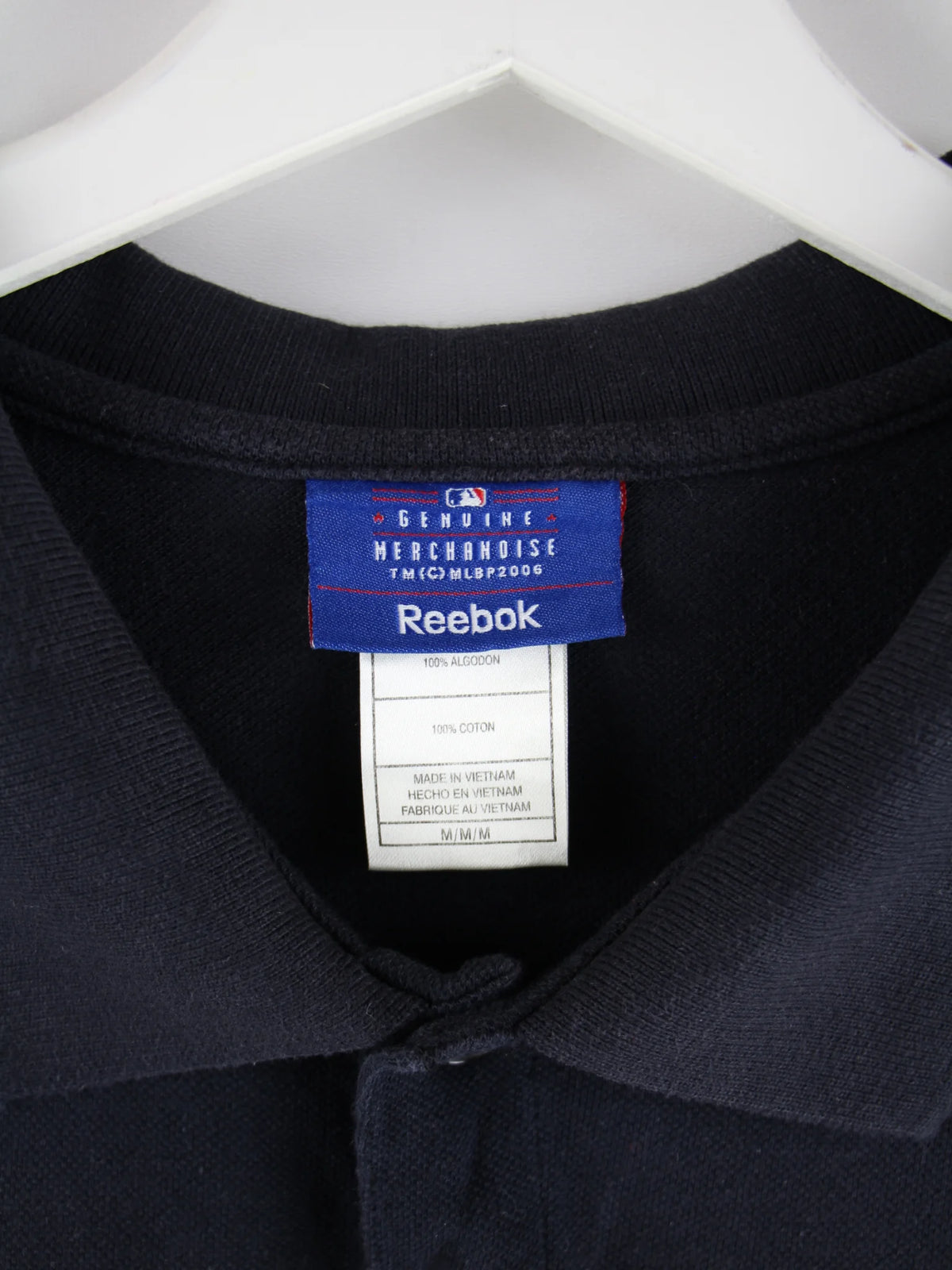 Reebok Polo Schwarz M – Etikett